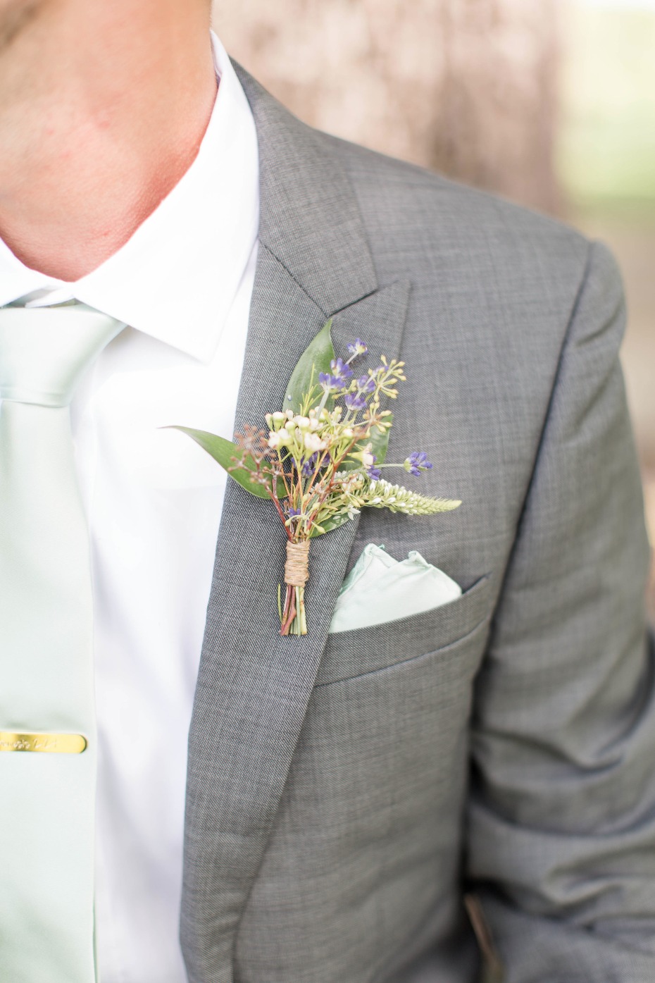 purple and mint rustic boutonniÃ¨re wrapped in twine