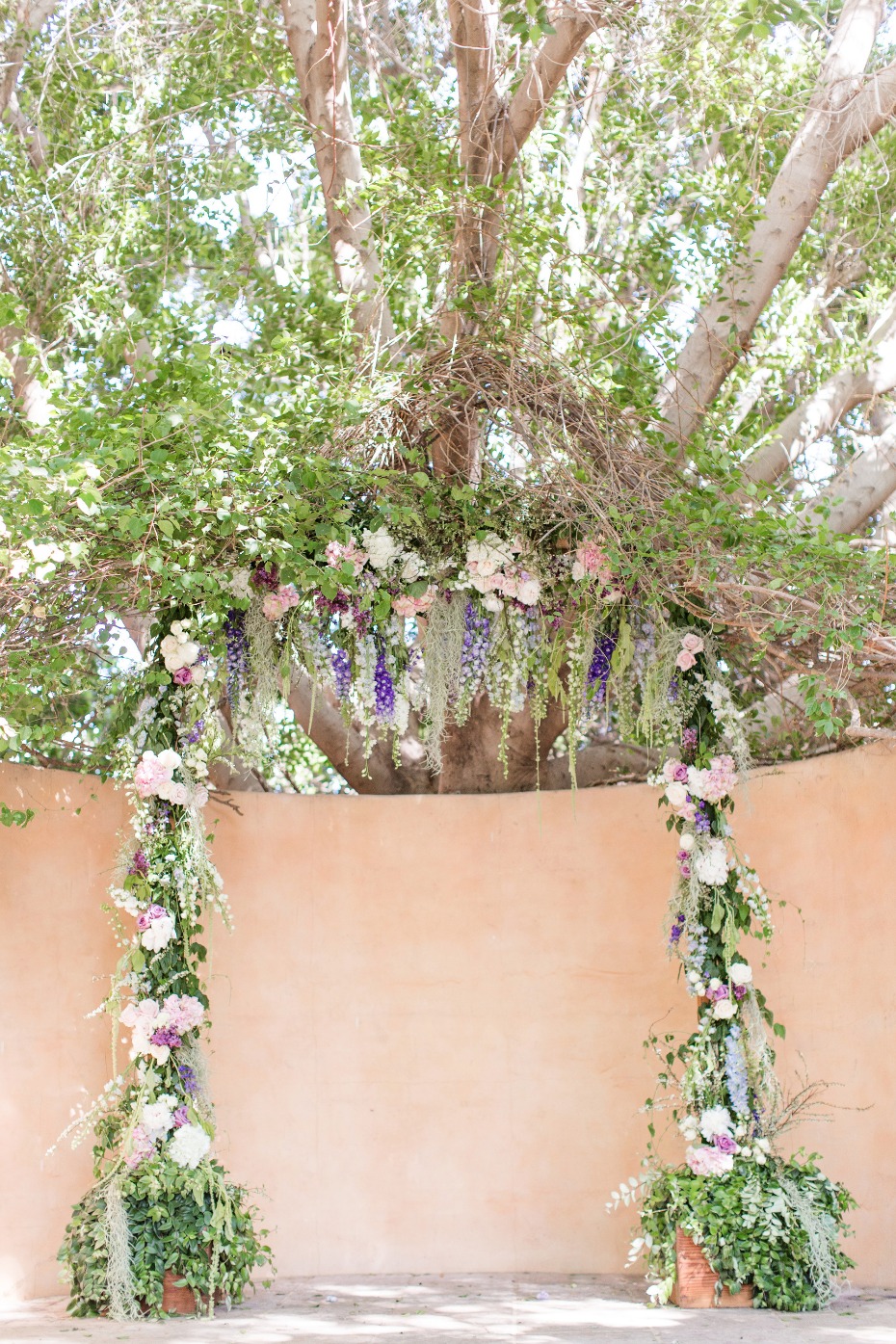 Over the top floral ceremony arch