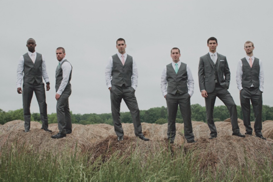 groom and his groomsmen in matching grey