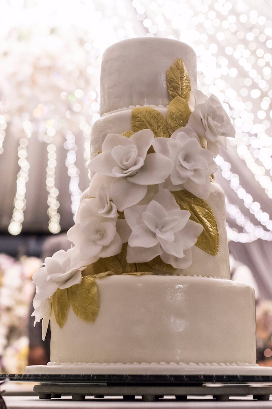 Elegant white wedding cake with floral decorations