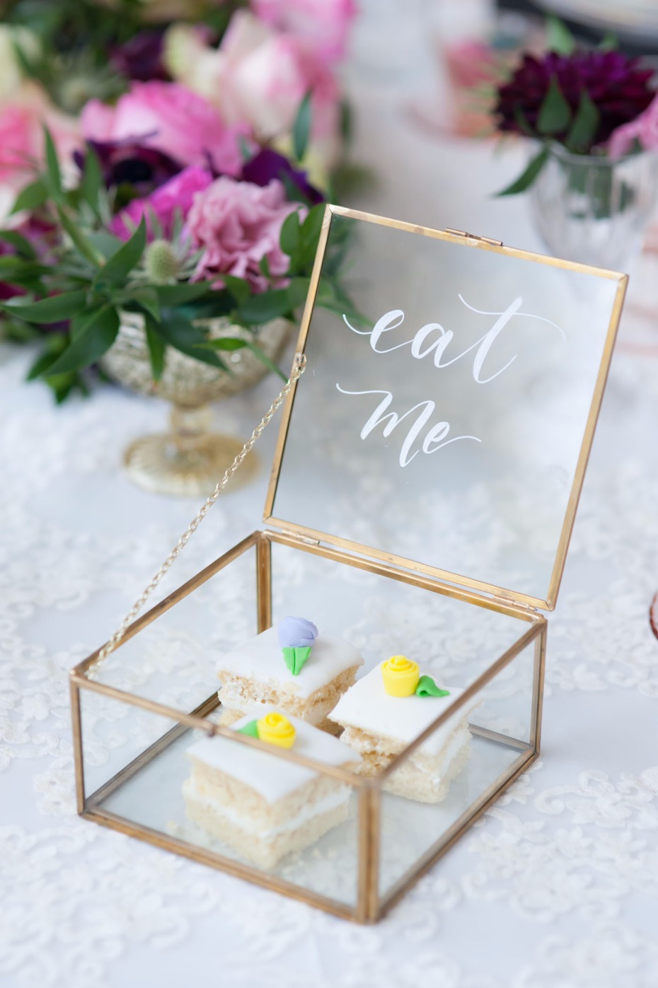 "Eat me" box of treats for an Alice in Wonderland wedding