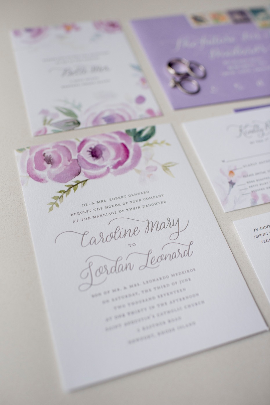 Classic purple floral themed wedding stationery