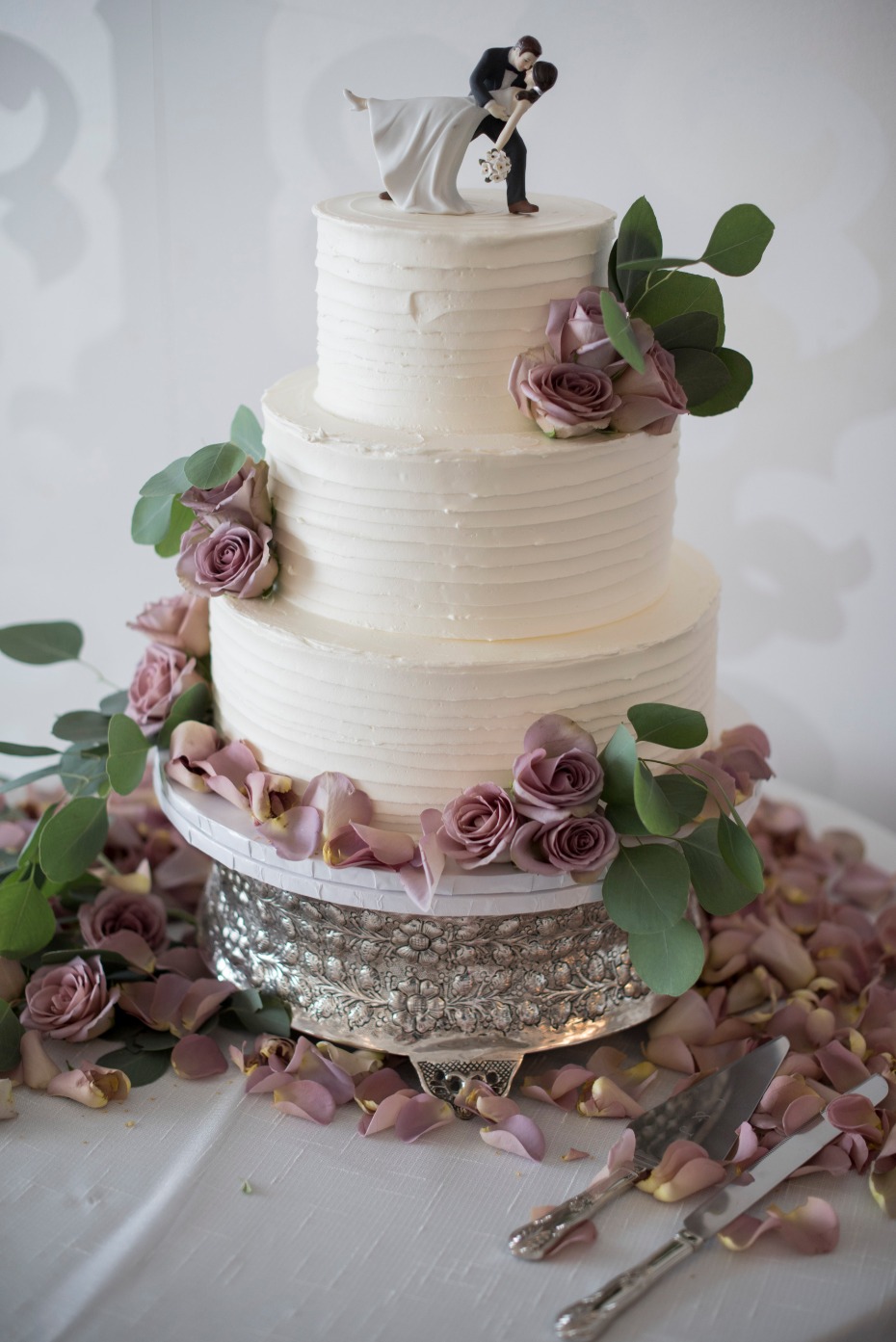 wedding cake with cute topper