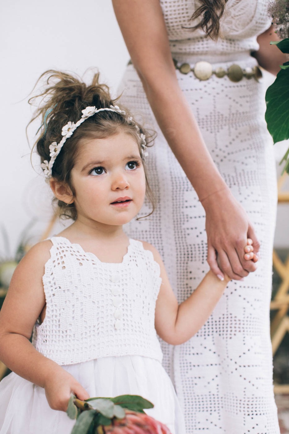 cute flower girl in white and faux flower halo