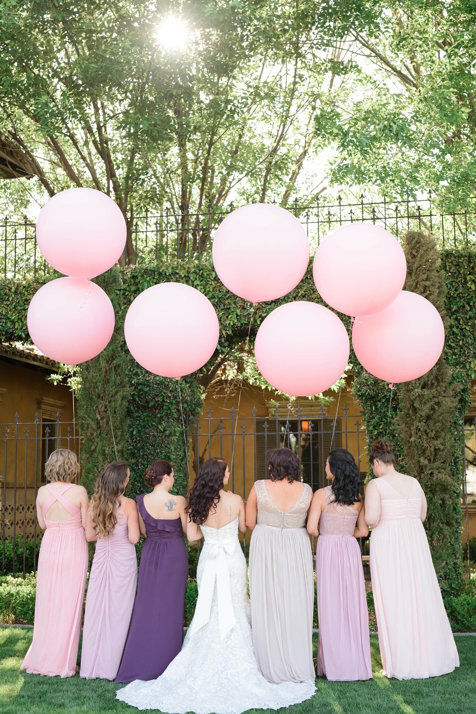 bridesmaids with giant balloons