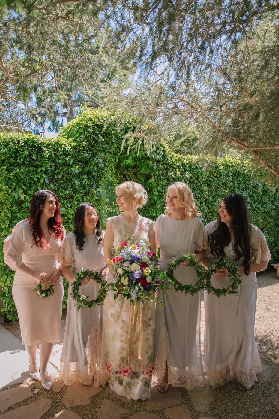 bridesmaids with wreath bouquets