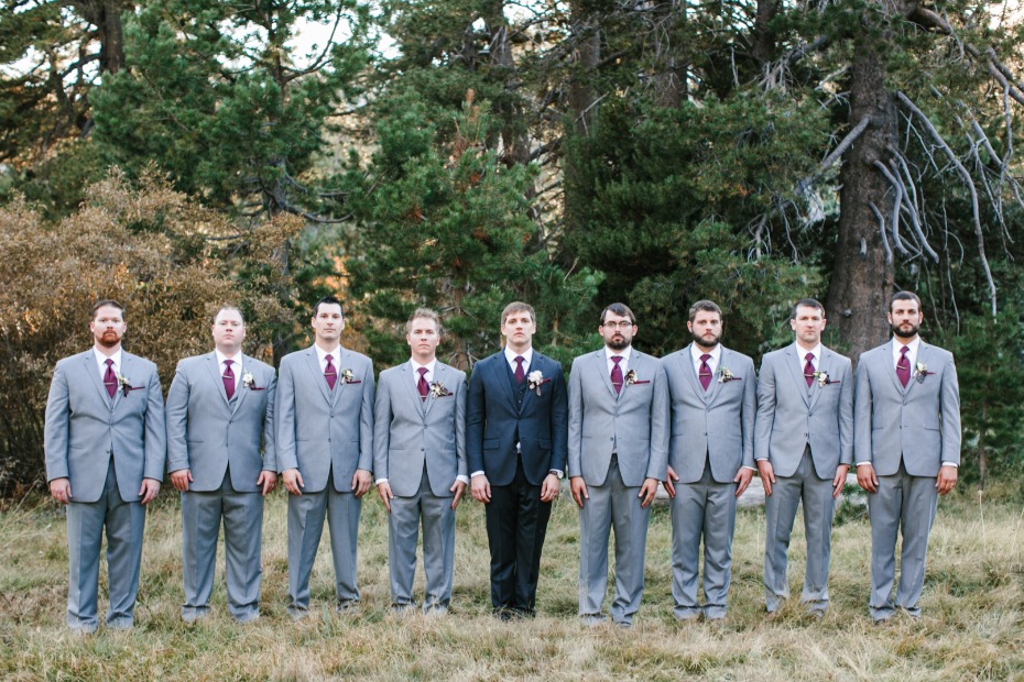 light grey groomsmen and groom in charcoal grey