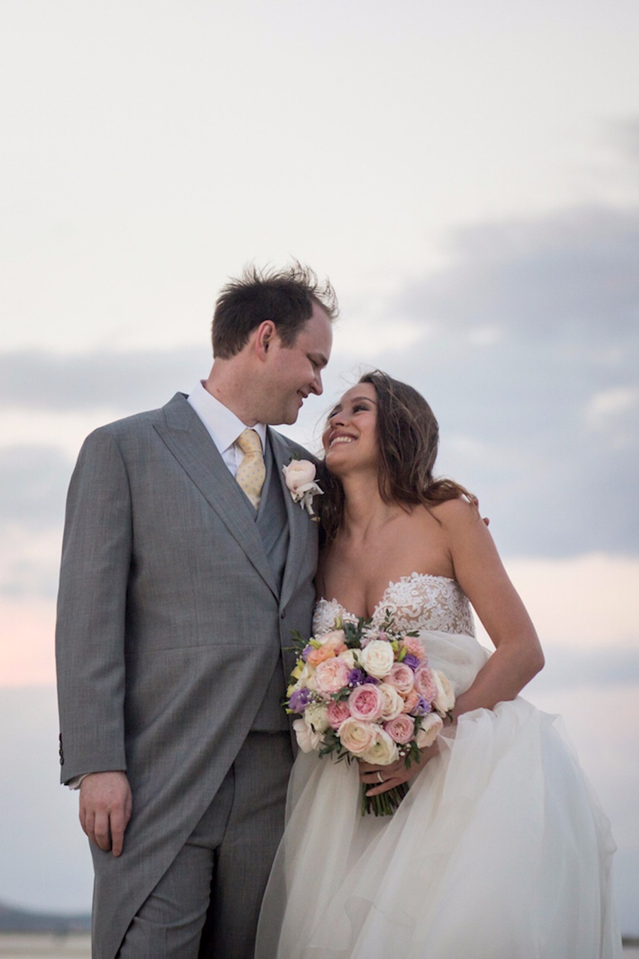 Happy wedding couple gazing lovingly at each other