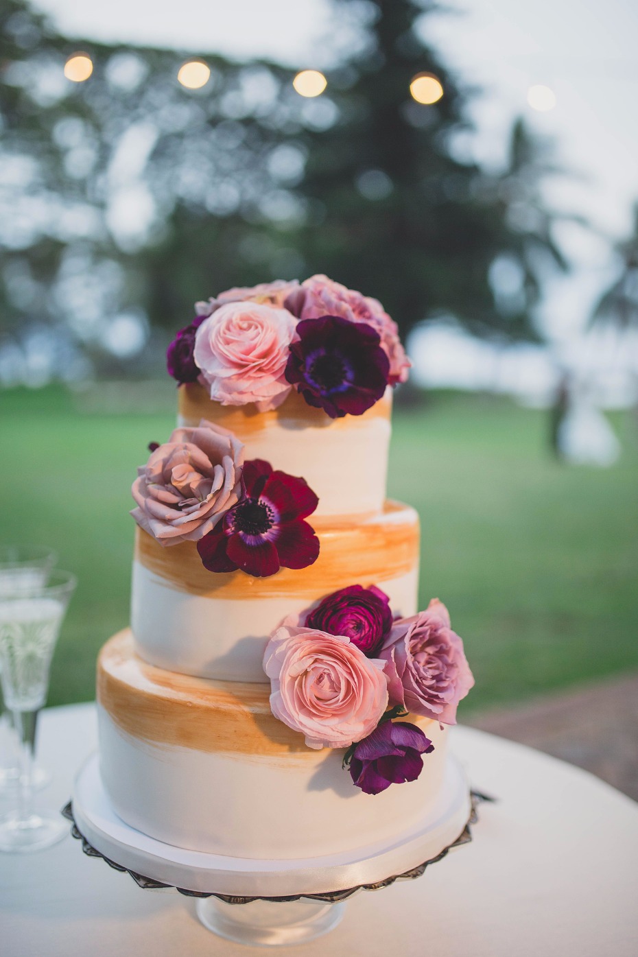 Berry toned floral wedding cake