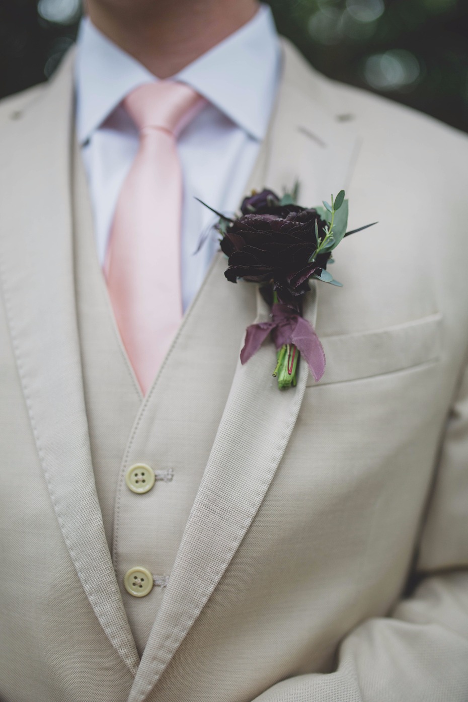 Dark and moody boutonniere
