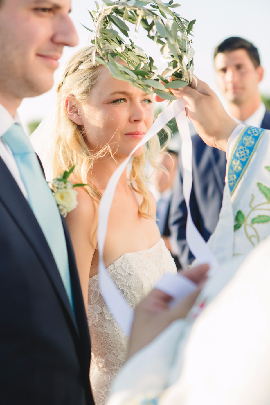 Beautiful bride in a lace dress at her wedding ceremony