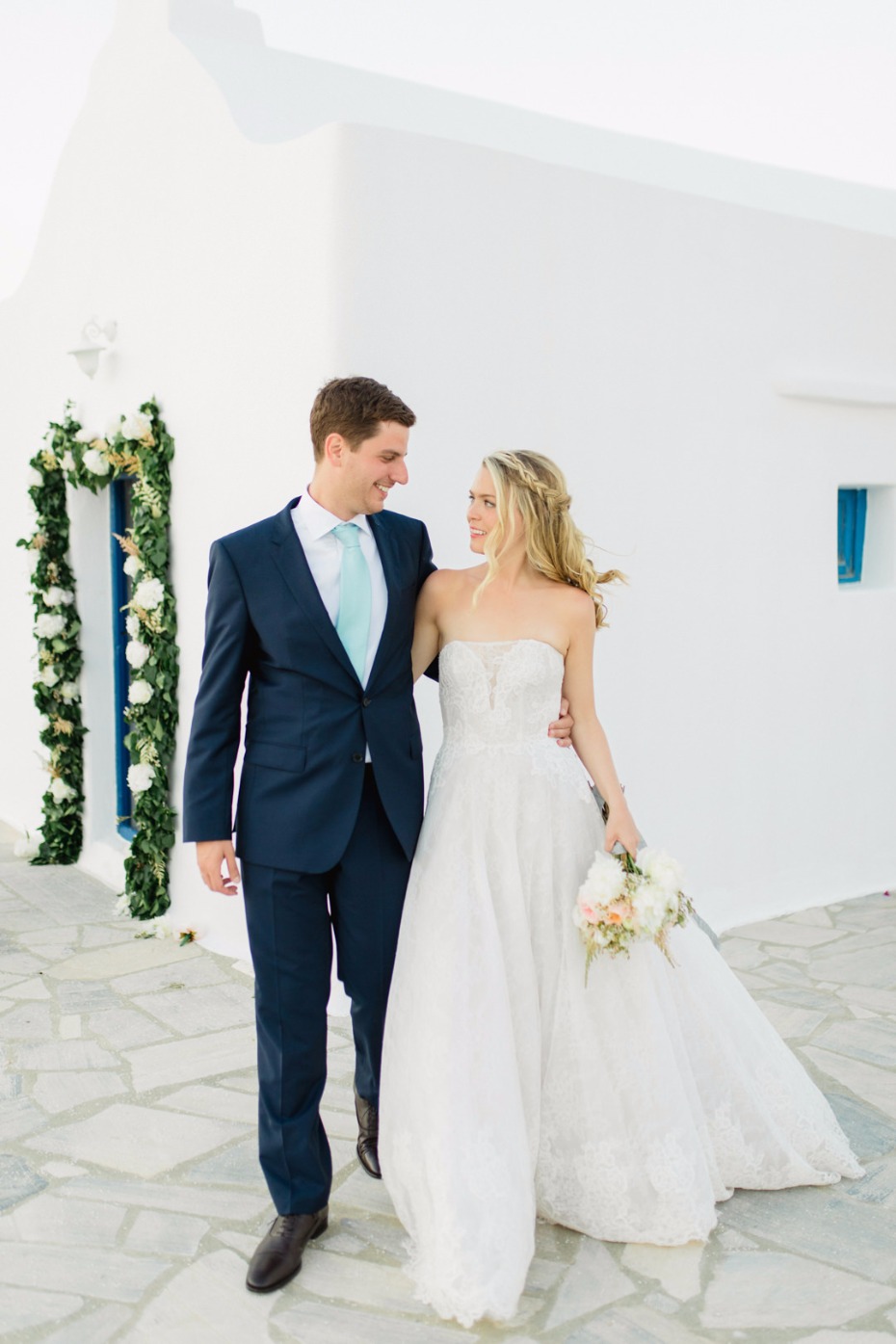 Happy couple walking together on their wedding day
