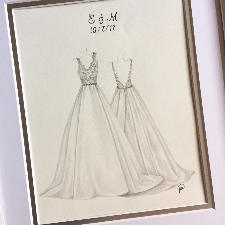 Framed pencil drawing of two wedding gowns and a date