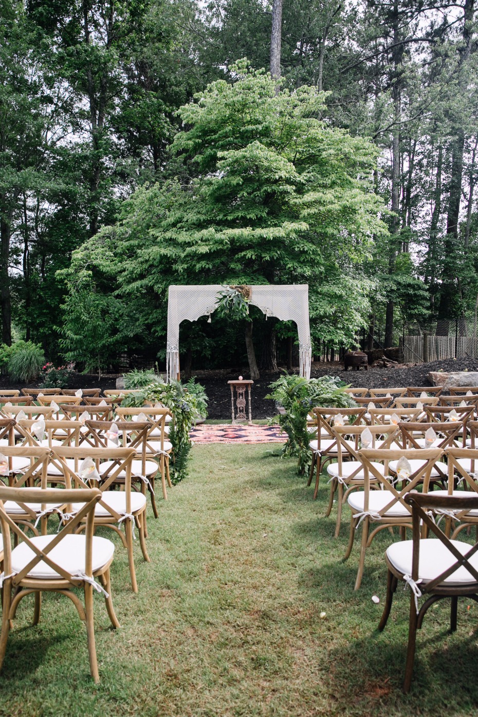 Boho styled ceremony with loads of plants