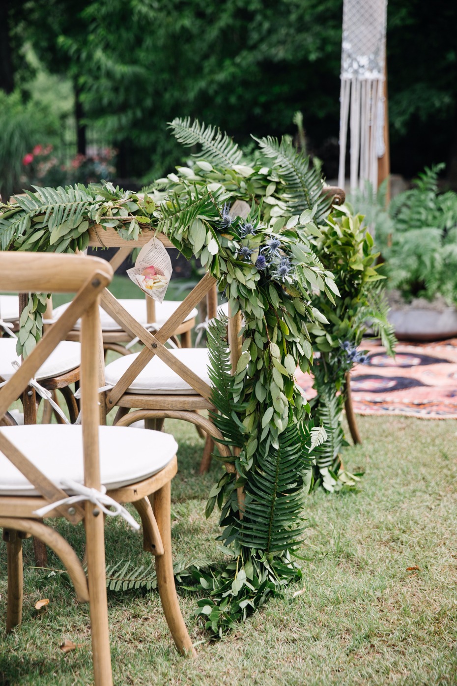 Cover your chairs in greenery