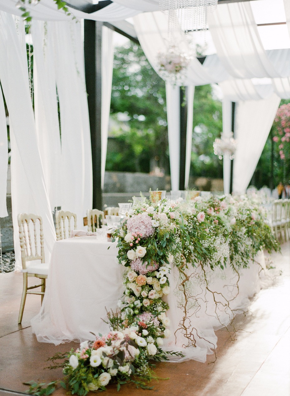 wedding party table with a practical garden cascading down the sides of the table