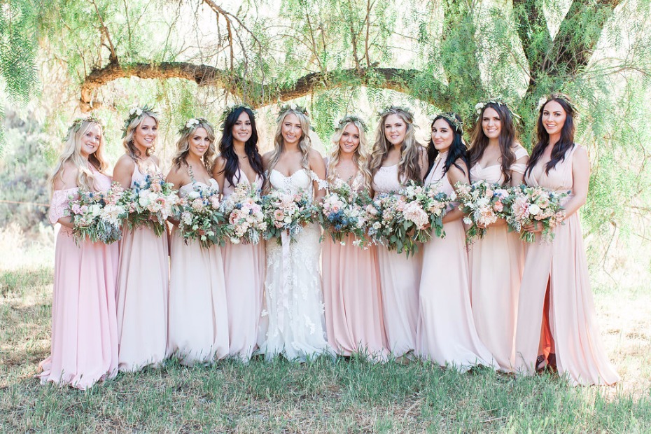 Bridesmaids in mix and match bridesmaid dresses