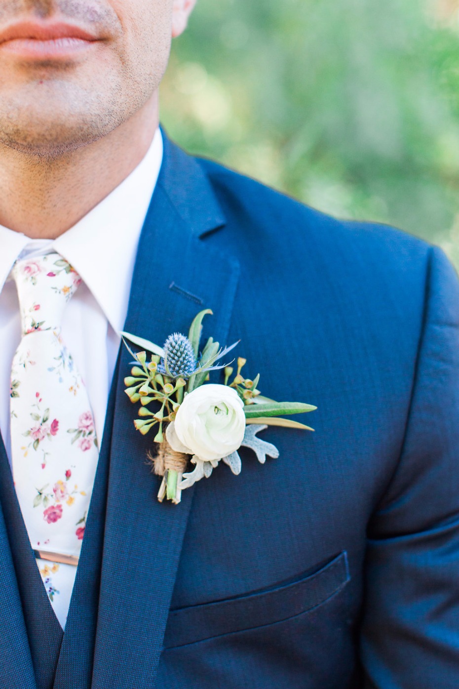 Navy suit with floral tie