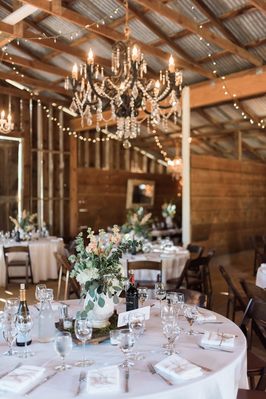 Dreamy barn venue with chandeliers