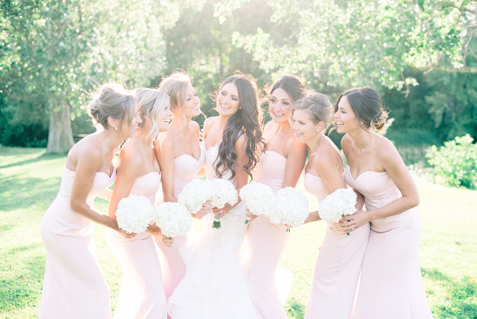 Blush dresses and white bouquet