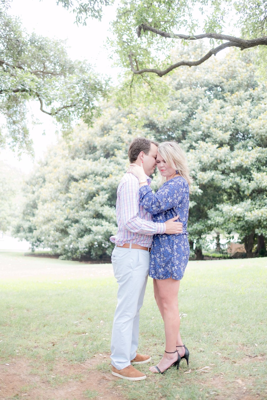 Loving couple embracing in a park, romantic moment captured