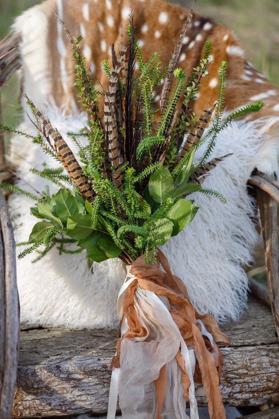 greenery and feathers wedding bouquet