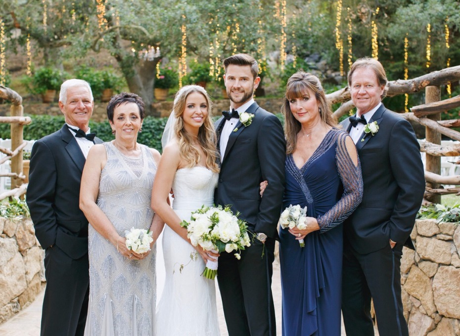 Bride groom and family at outdoor wedding venue