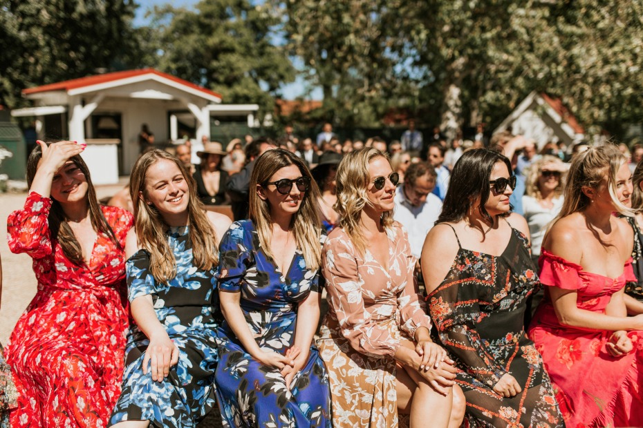 mismatched bridesmaids in floral dresses