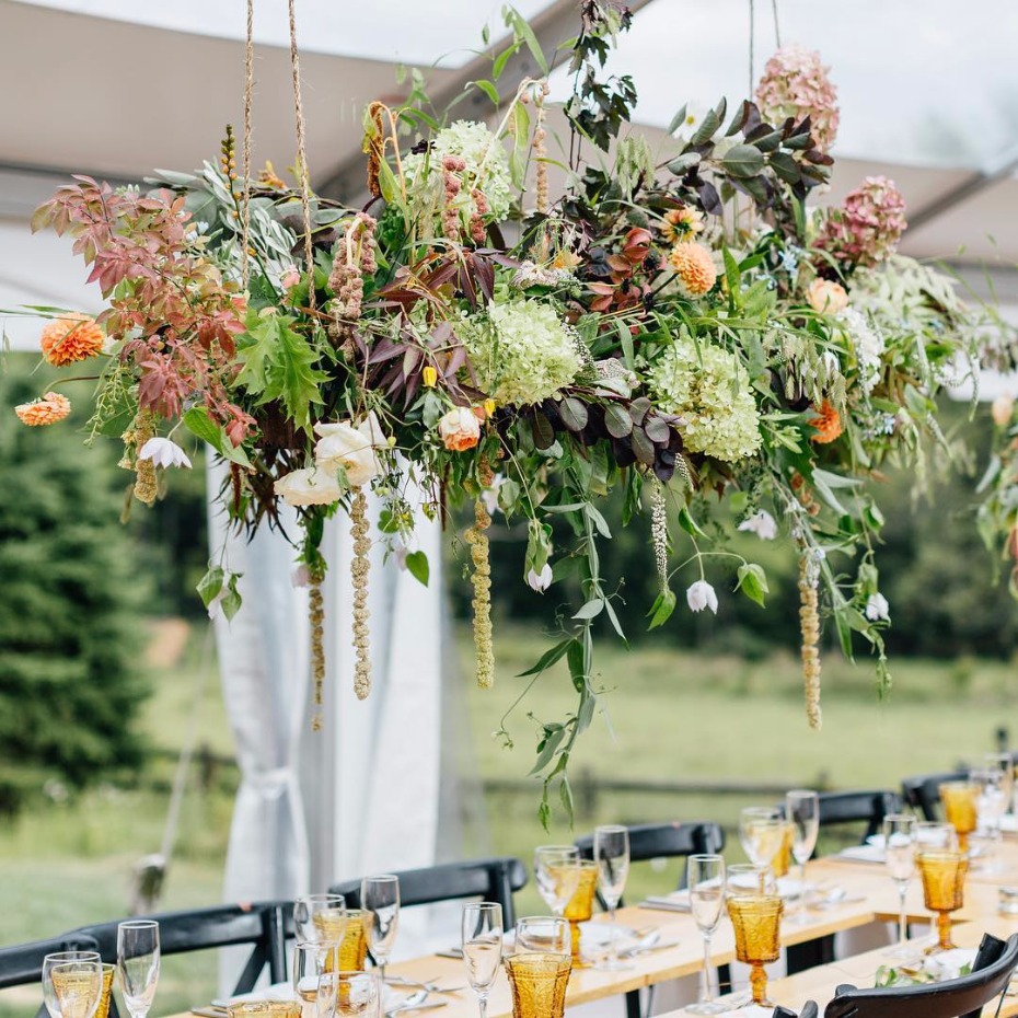 hanging flowers at an outdoor wedding