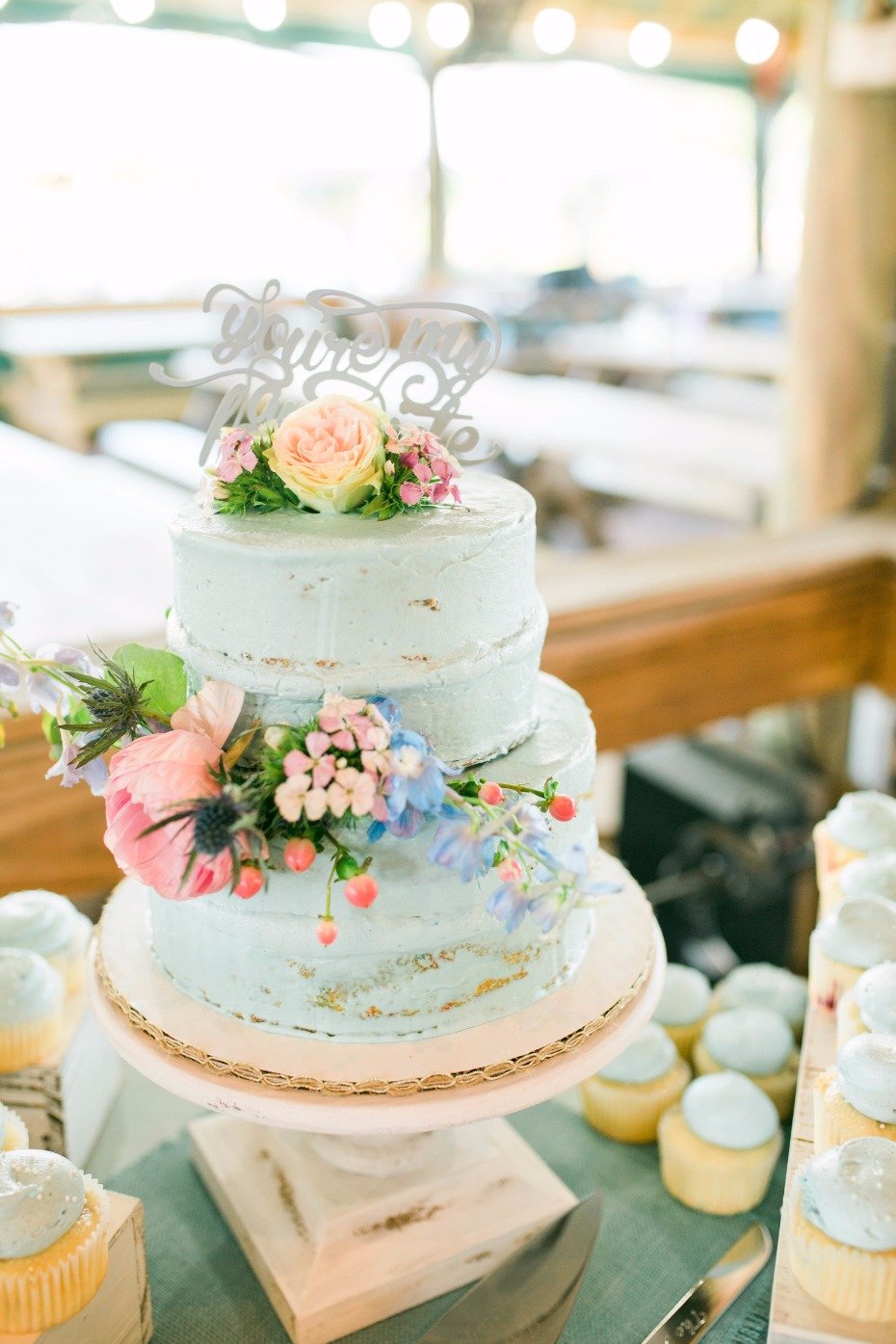 blue frosted wedding cake