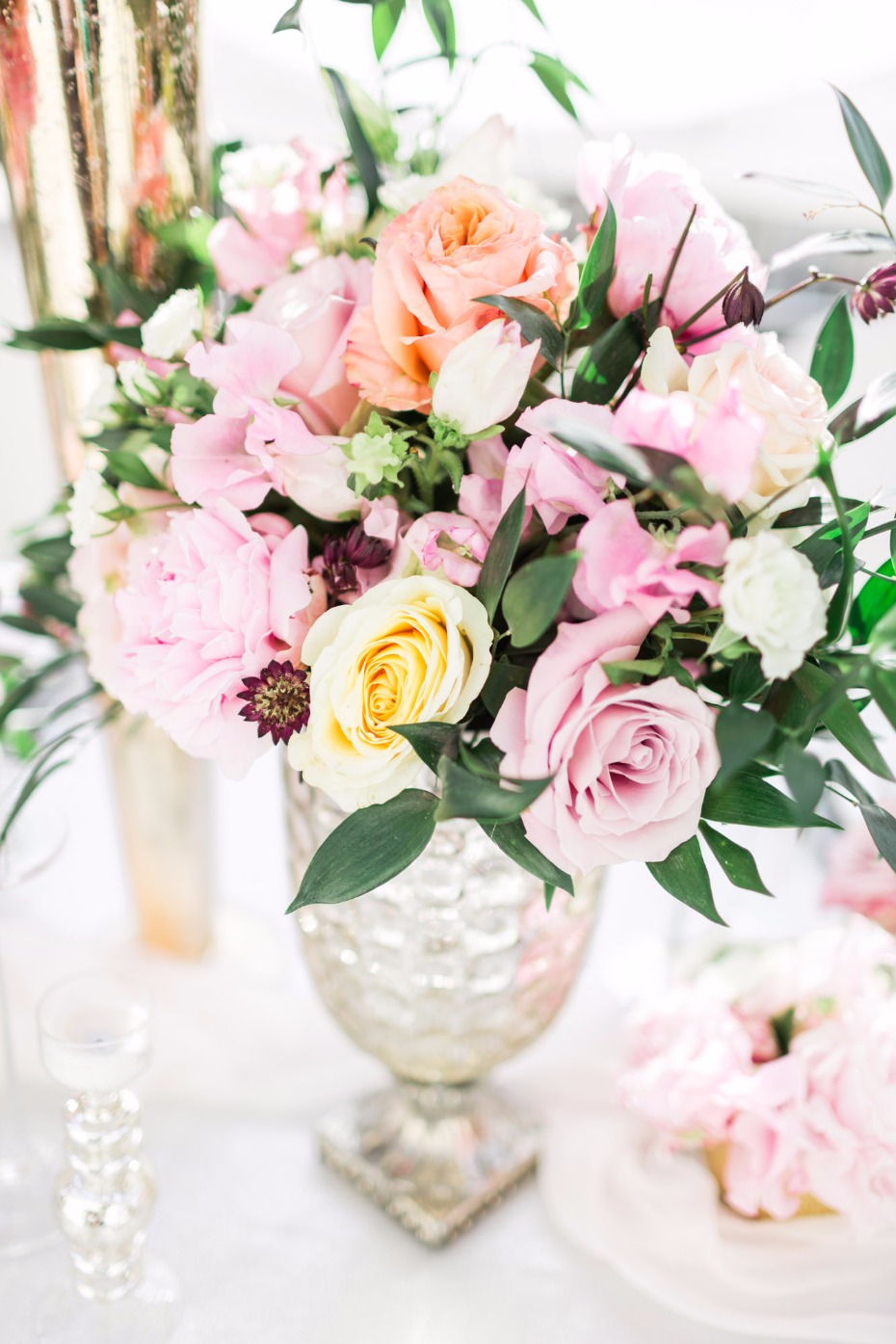 pink summer time wedding floral arrangement
