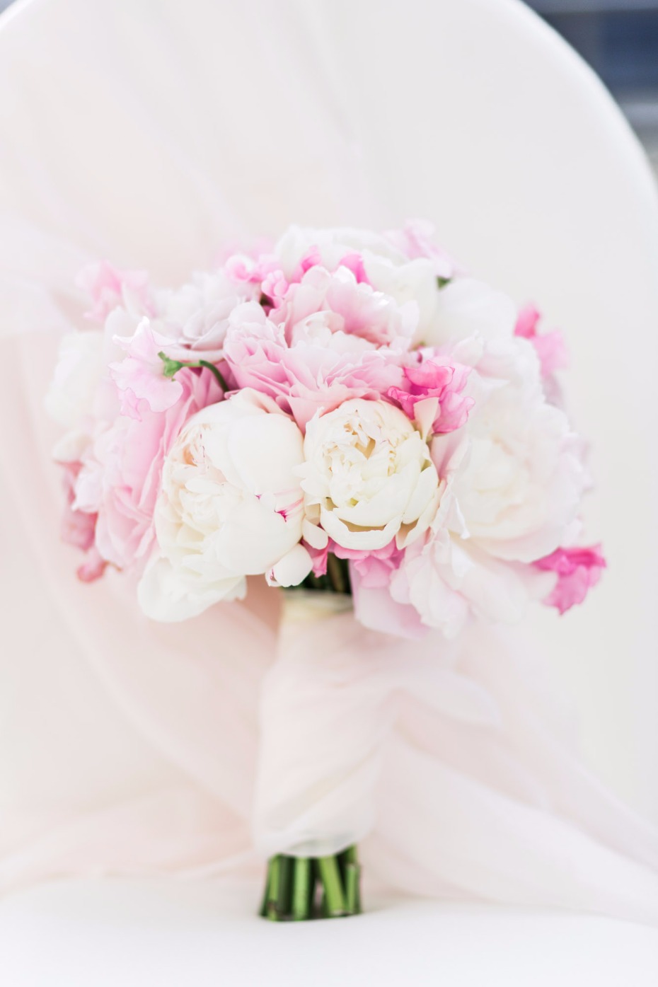 Bridal bouquet of pink and white peonies close up