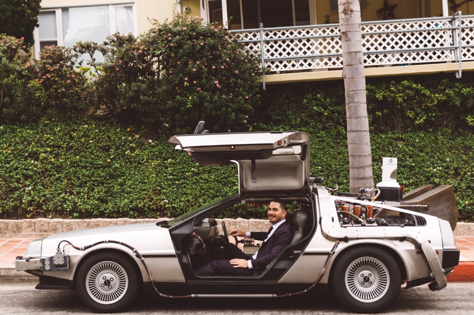Back to the Future Delorean as the Photo Booth backdrop for the groom