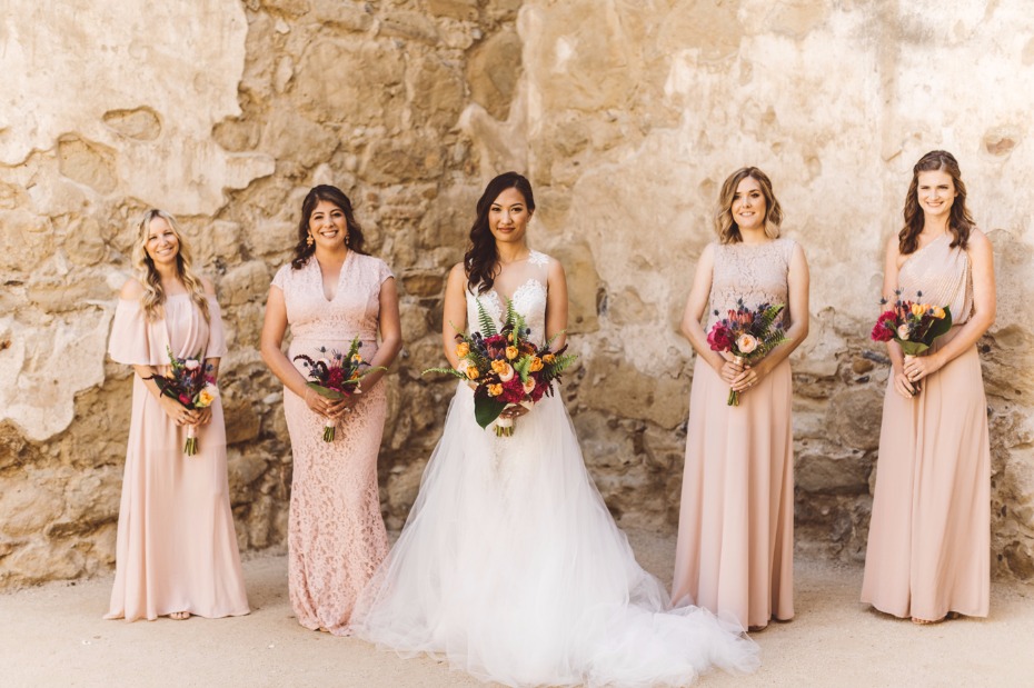 Mismatched bridesmaid dresses in blush