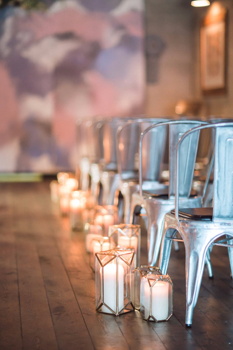 Aisle seating with candles in modern wedding decor