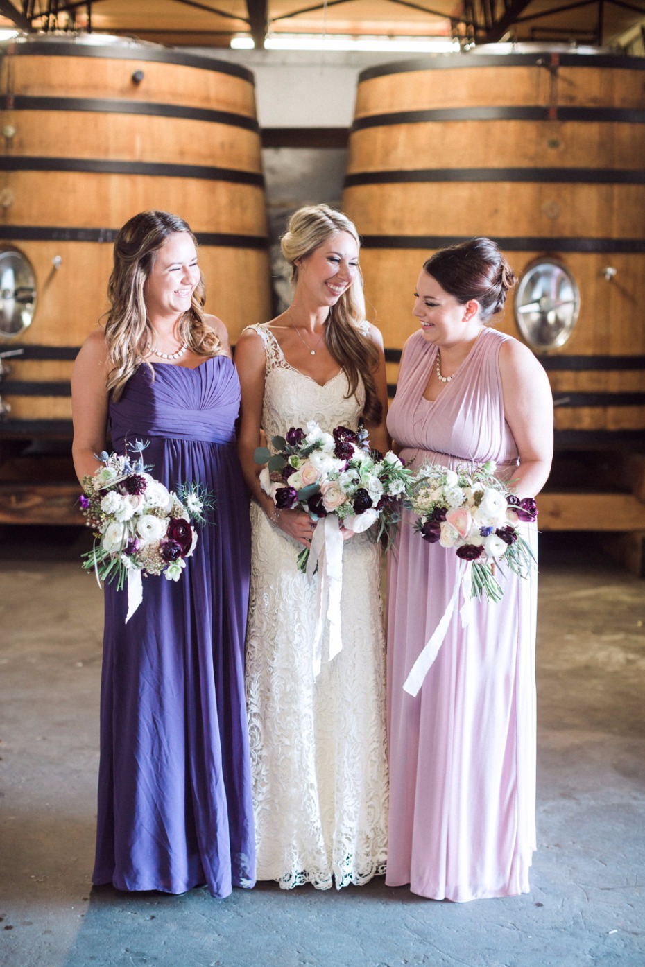 Bride and bridesmaids at winery wedding celebration