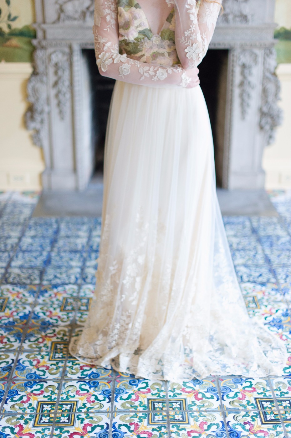 Floral lace wedding gown with sheer sleeves detail