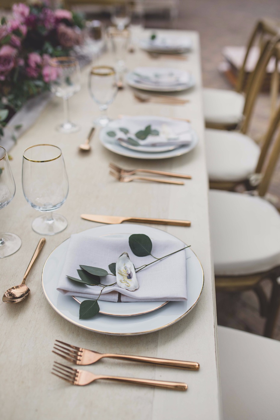 Simple and elegant table setting with copper flatware