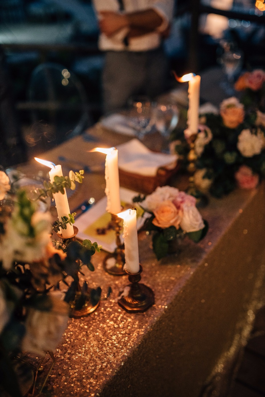 candle lit wedding reception with vintage candlesticks