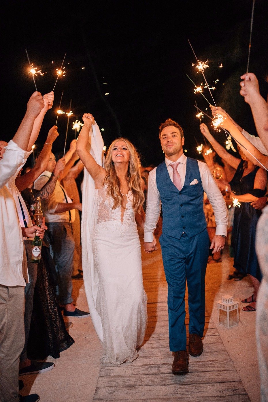 sparkler exit for the bride and groom at their beach wedding