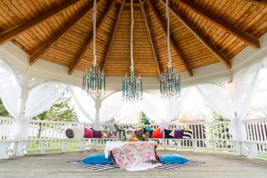 Jewel toned seating area for the bride and groom