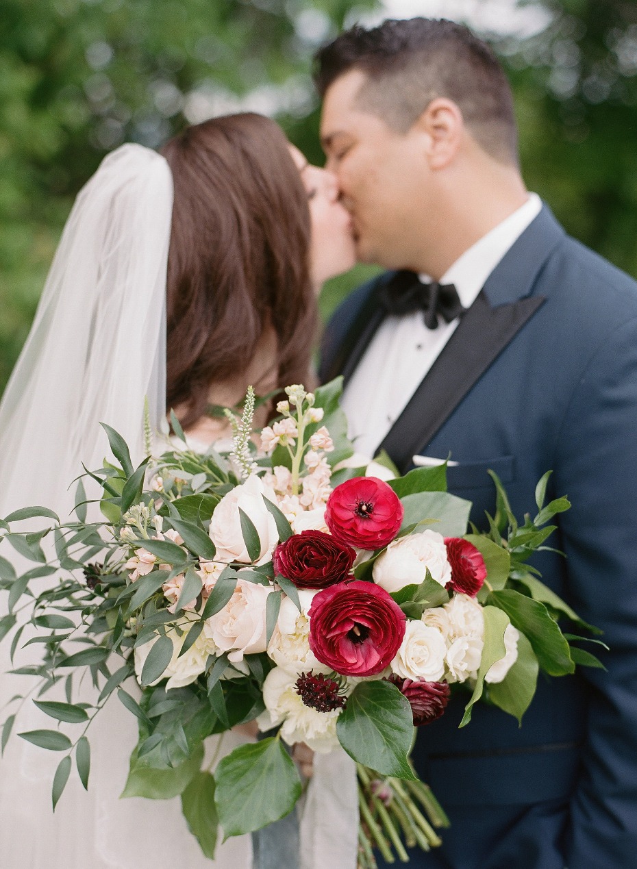 wedding bouquet and wedding kiss