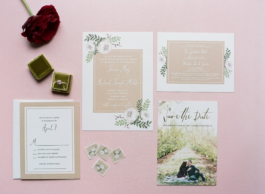 Elegant wedding invitation suite with ring and floral accents