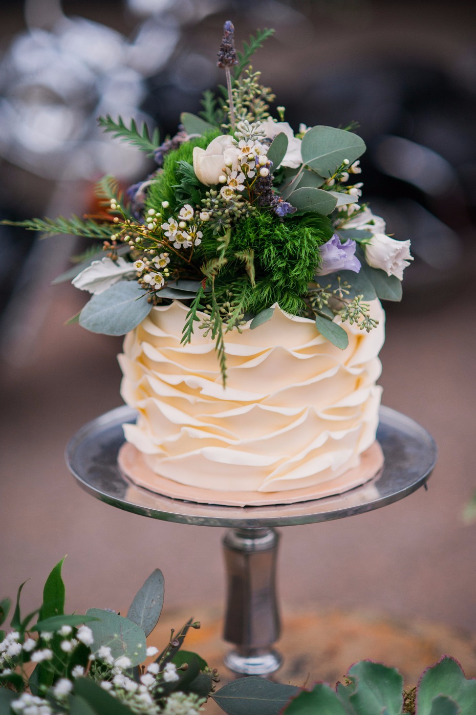 Greenery topped petal cake