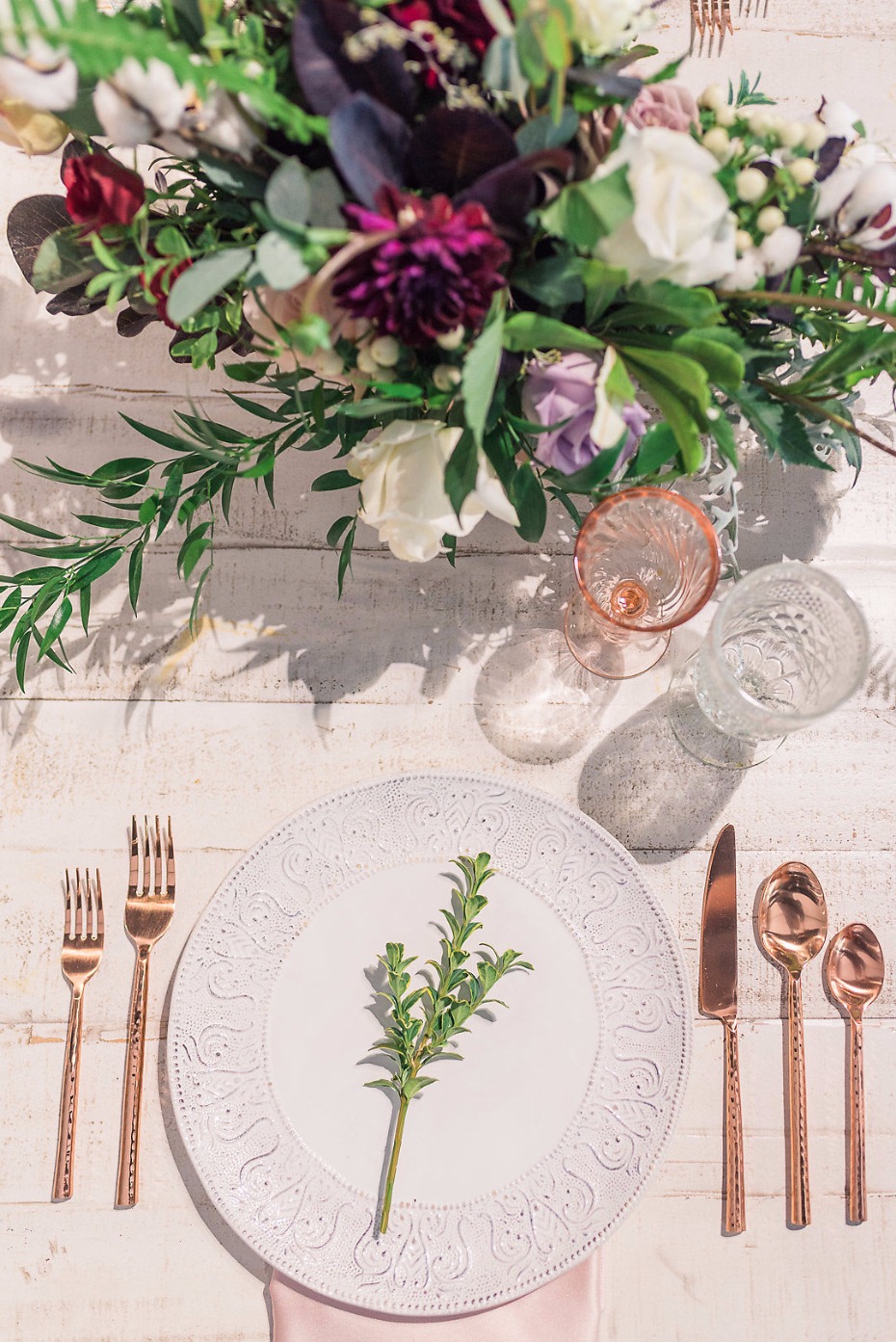 Simple place setting with rose gold flatware
