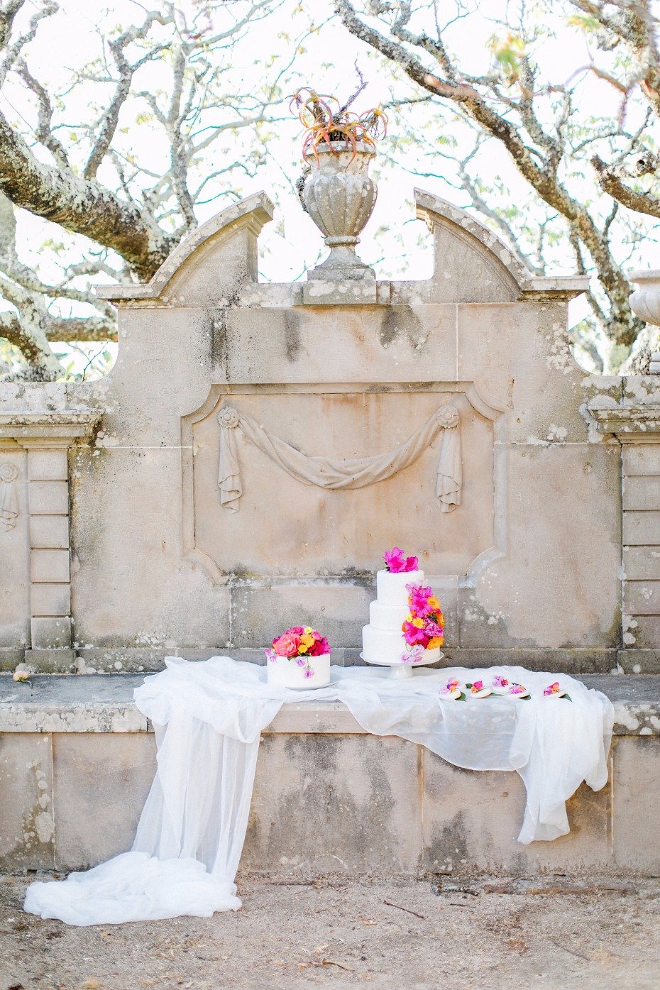 romantic outdoor wedding cake display