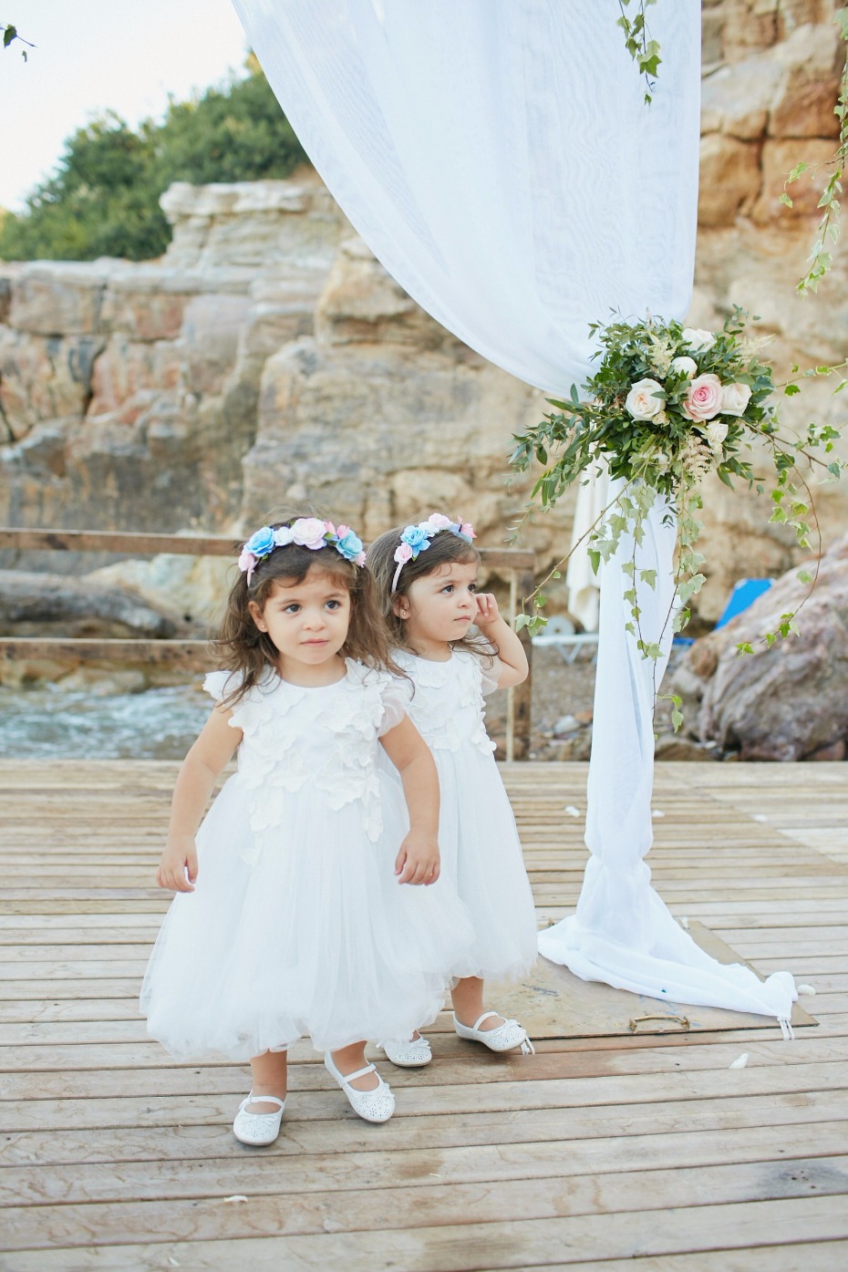 sweet flower girls all set for the walk down the aisle