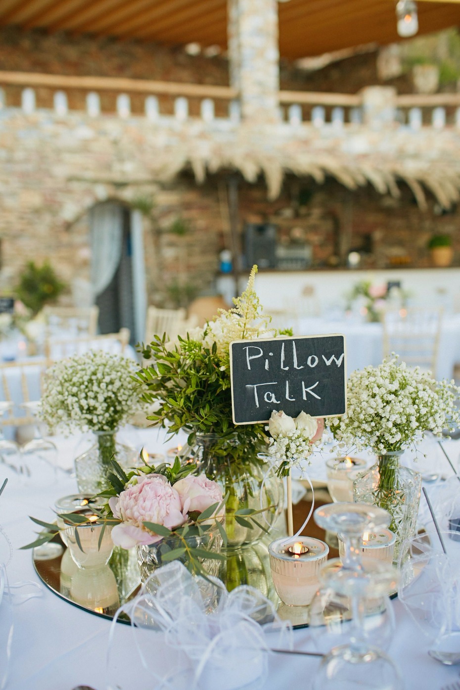 pillow talk wedding table name and whimsial centerpiece