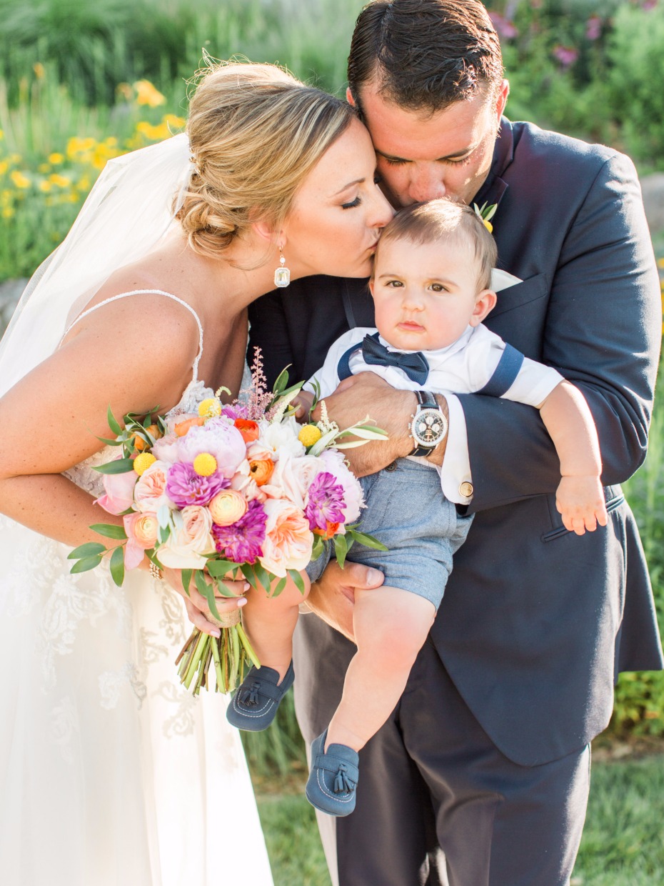 sweet wedding family with baby ring bearer