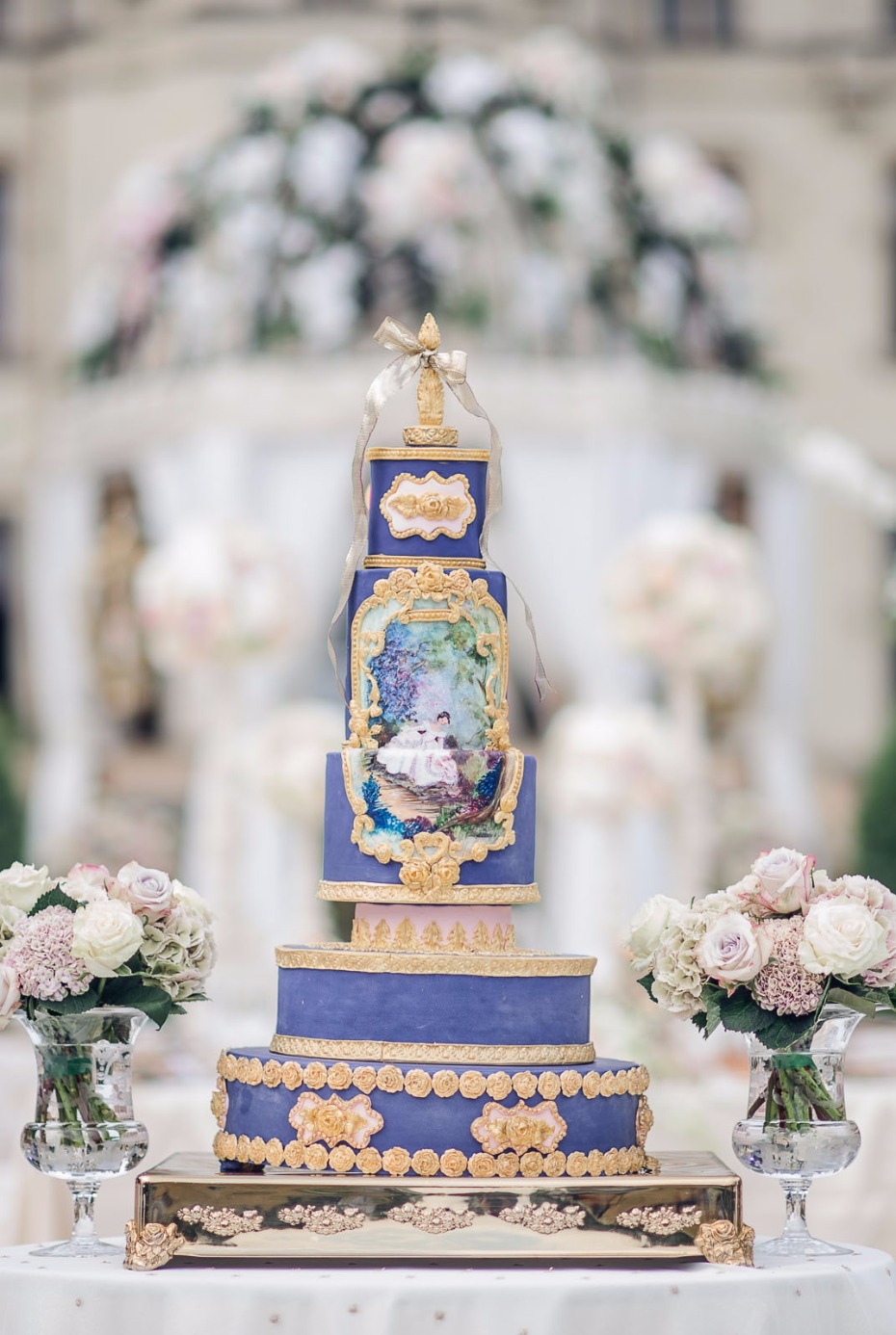 storybook fantasy wedding cake in purple and gold